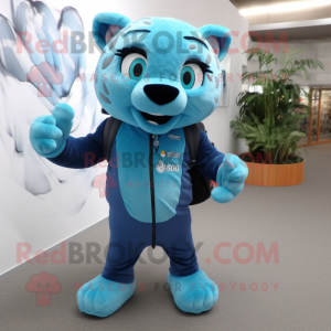 Cyan Jaguar mascot costume character dressed with a Trousers and Backpacks