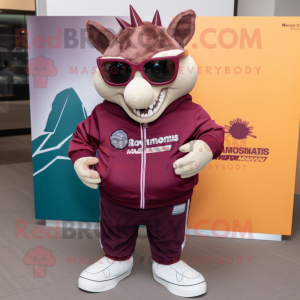 Maroon Armadillo mascot costume character dressed with a Sweatshirt and Sunglasses