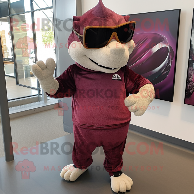 Maroon Armadillo mascot costume character dressed with a Sweatshirt and Sunglasses