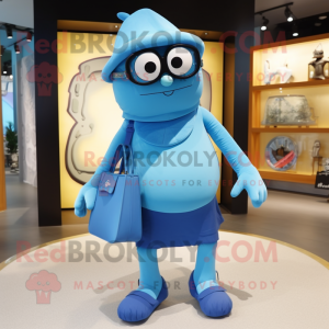 Blue Cyclops mascot costume character dressed with a Culottes and Handbags