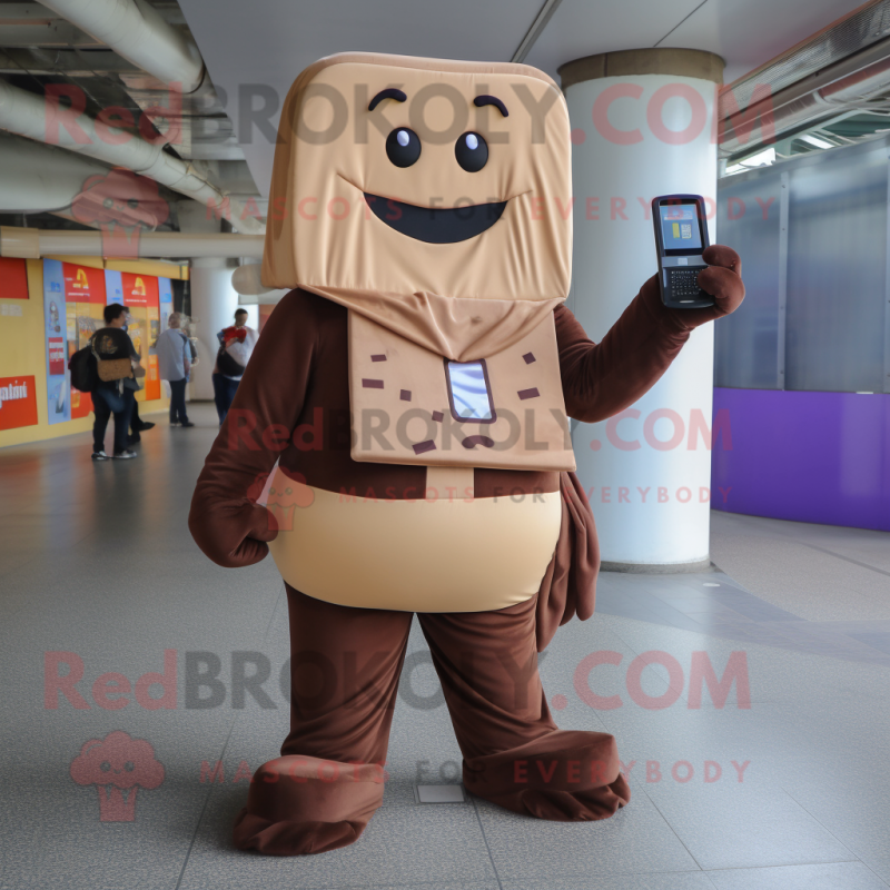 Tan Chocolate Bar mascot costume character dressed with a Jumpsuit and Messenger bags