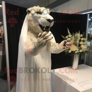 nan Smilodon mascot costume character dressed with a Wedding Dress and Rings