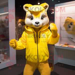 Yellow Marten mascot costume character dressed with a Sweatshirt and Rings