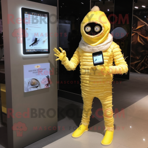 Lemon Yellow Mummy mascot costume character dressed with a Coat and Digital watches