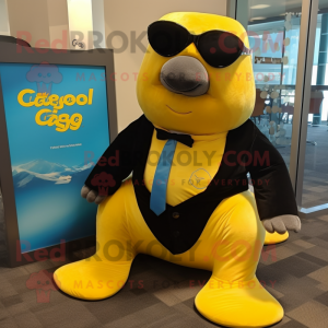 Yellow Stellar'S Sea Cow mascot costume character dressed with a Tuxedo and Sunglasses