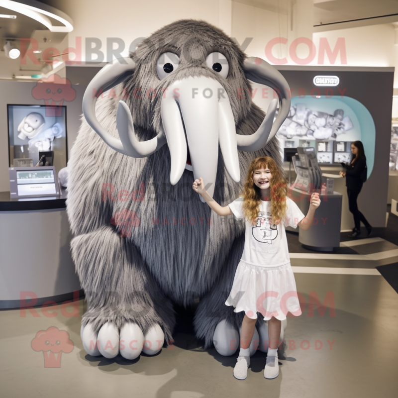 Silver Mammoth mascot costume character dressed with a A-Line Skirt and Hairpins Silver Mammoth mascot costume character dressed with a A-Line Skirt and Hairpins