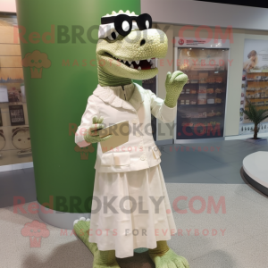 Cream Crocodile mascot costume character dressed with a Empire Waist Dress and Reading glasses