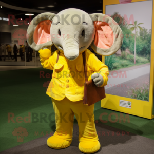 Yellow Elephant mascot costume character dressed with a Corduroy Pants and Coin purses