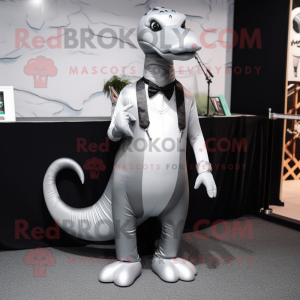 Silver Diplodocus mascot costume character dressed with a Suit Pants and Hair clips