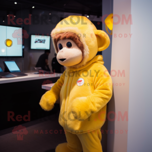 Yellow Monkey mascot costume character dressed with a Hoodie and Earrings