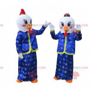 Mascots of white chickens in Asian outfits, roosters costumes -