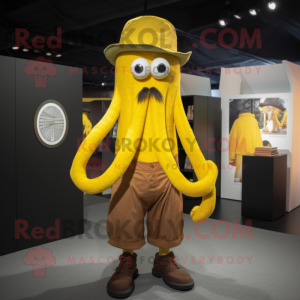 Yellow Kraken mascot costume character dressed with a Vest and Hats