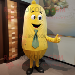 Gold Zucchini mascot costume character dressed with a Henley Shirt and Tie pins