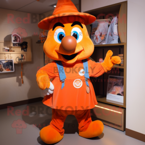 Orange Magician mascot costume character dressed with a Dungarees and Keychains