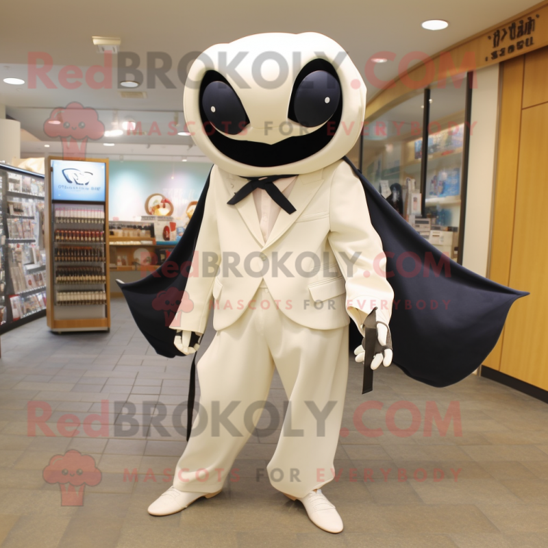 Cream Manta Ray mascot costume character dressed with a Suit Pants and Backpacks Cream Manta Ray mascot costume character dressed with a Suit Pants and Backpacks