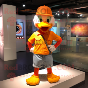 Orange Duck mascot costume character dressed with a Henley Tee and Headbands