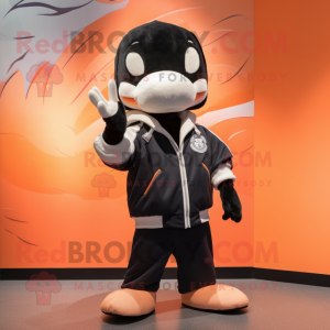 Peach Killer Whale mascot costume character dressed with a Parka and Cummerbunds