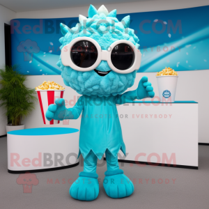 Turquoise Pop Corn mascot costume character dressed with a One-Piece Swimsuit and Rings