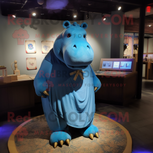 Blue Hippopotamus mascot costume character dressed with a Romper and Shawl pins