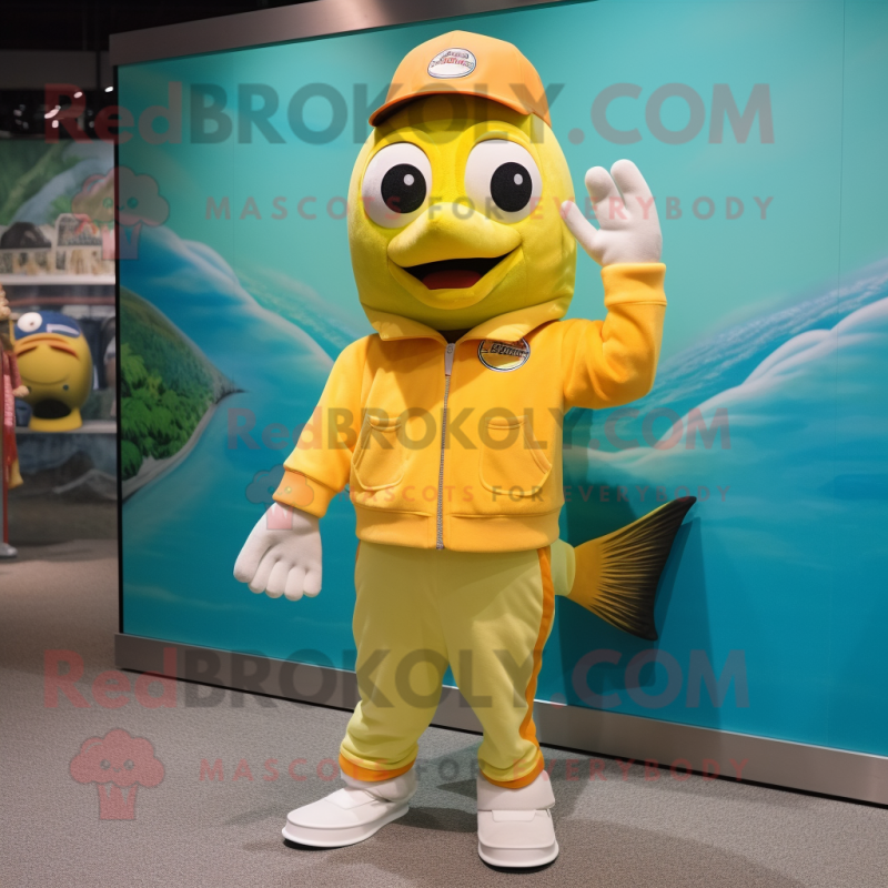 Yellow Salmon mascot costume character dressed with a Bermuda Shorts and Gloves Yellow Salmon mascot costume character dressed with a Bermuda Shorts and Gloves