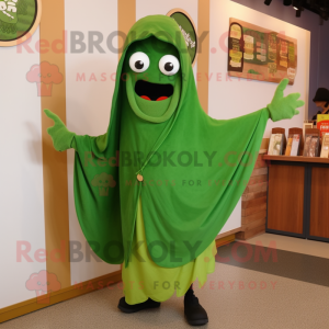 Forest Green Pesto Pasta mascot costume character dressed with a Coat and Shawl pins