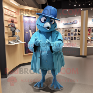 Turquoise Blue Jay mascot costume character dressed with a Coat and Hat pins