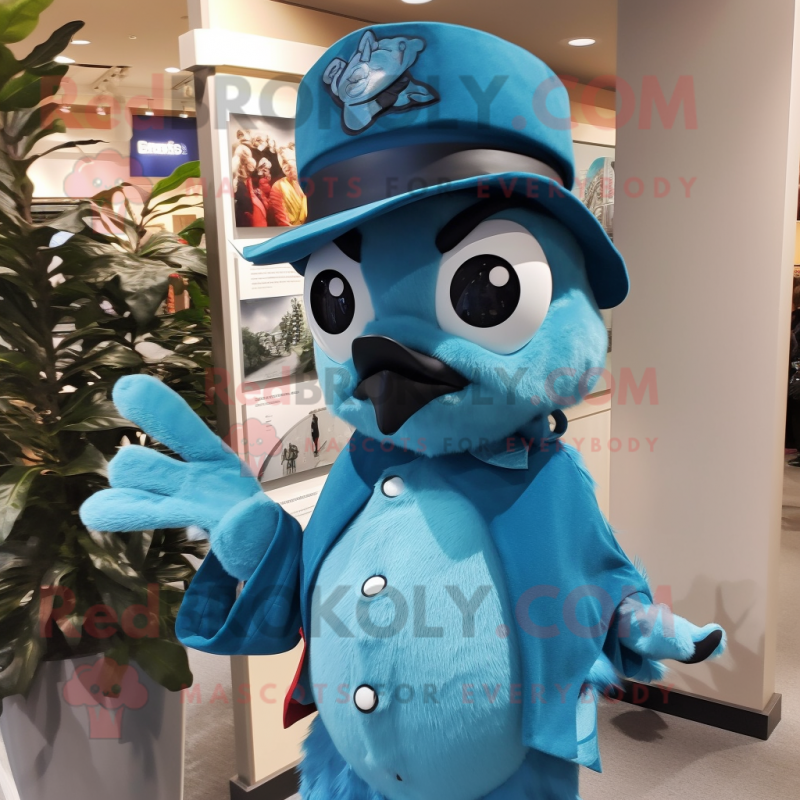 Turquoise Blue Jay mascot costume character dressed with a Coat and Hat pins