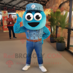 Teal Shakshuka mascot costume character dressed with a Denim Shirt and Belts