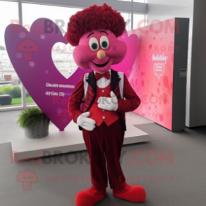 Magenta Heart mascot costume character dressed with a Waistcoat and Suspenders