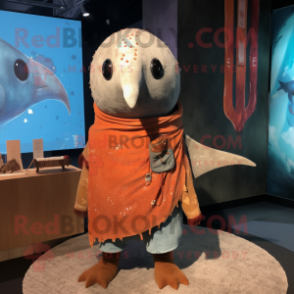 Rust Narwhal mascot costume character dressed with a Swimwear and Shawl pins