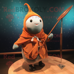 Rust Narwhal mascot costume character dressed with a Swimwear and Shawl pins