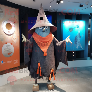 nan Witch'S Hat mascot costume character dressed with a Board Shorts and Shawls