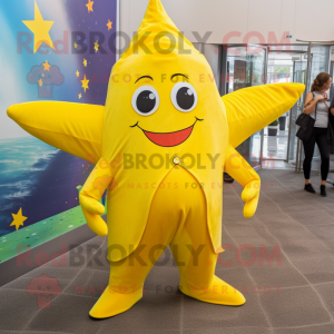 Yellow Starfish mascot costume character dressed with a A-Line Dress and Backpacks