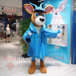 Blue Deer mascot costume character dressed with a Raincoat and Messenger bags