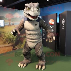 Gray Komodo Dragon mascot costume character dressed with a Rugby Shirt and Caps