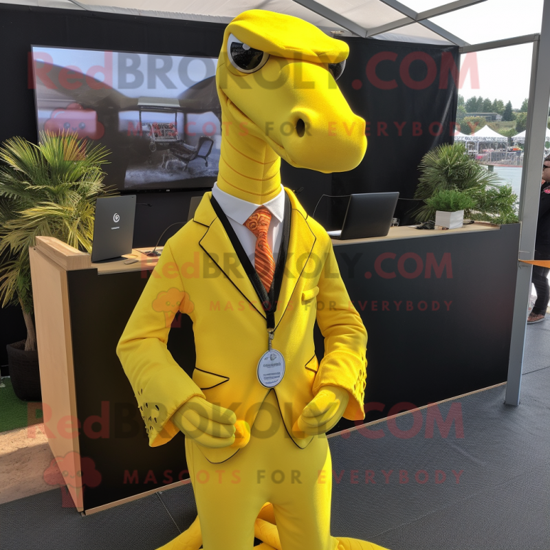 Yellow Loch Ness Monster mascot costume character dressed with a Suit Jacket and Necklaces Yellow Loch Ness Monster mascot costume character dressed with a Suit Jacket and Necklaces