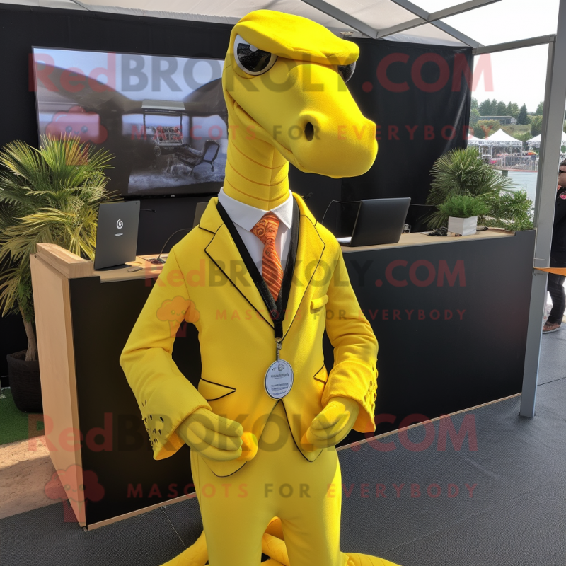 Yellow Loch Ness Monster mascot costume character dressed with a Suit Jacket and Necklaces