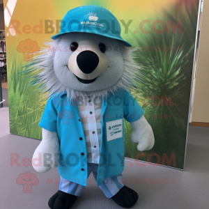 Cyan Porcupine mascot costume character dressed with a Oxford Shirt and Hat pins