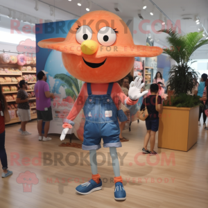 Peach Stilt Walker mascot costume character dressed with a Denim Shorts and Foot pads