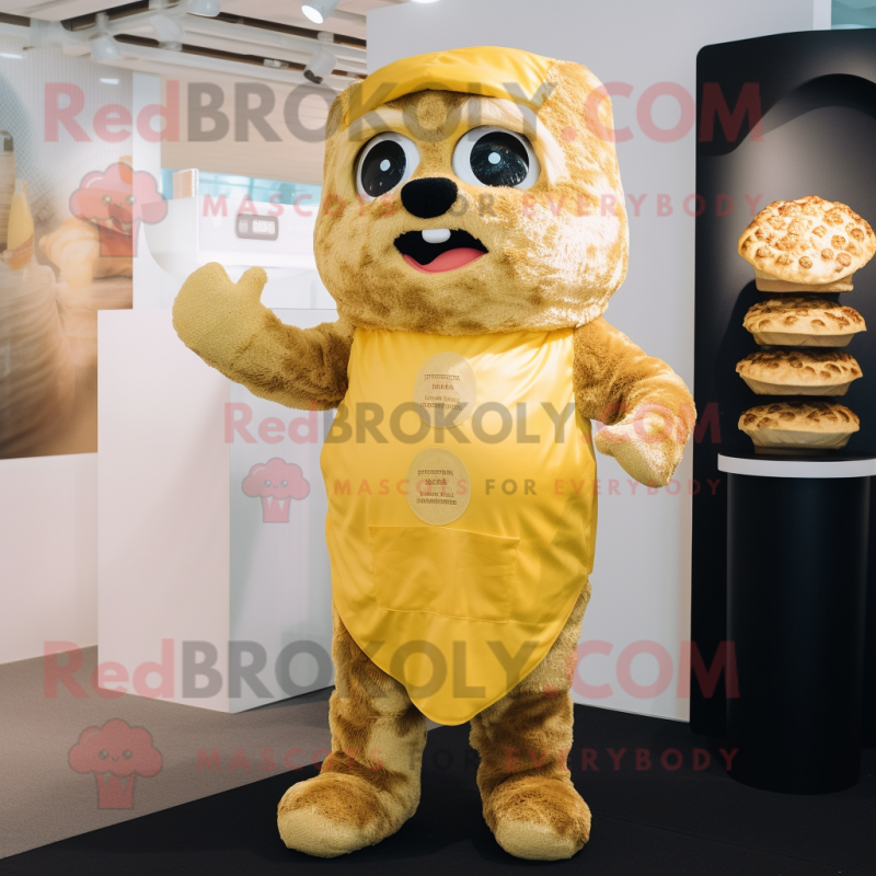 Gold Dim Sum mascot costume character dressed with a Dungarees and Gloves Gold Dim Sum mascot costume character dressed with a Dungarees and Gloves