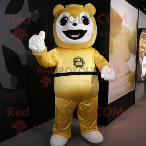 Gold Dim Sum mascot costume character dressed with a Dungarees and Gloves