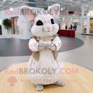 Cream Chinchilla mascot costume character dressed with a Dress and Rings