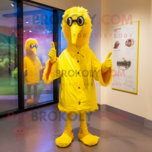 Lemon Yellow Ostrich mascot costume character dressed with a Raincoat and Cummerbunds