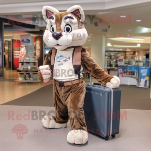 Brown Bobcat mascot costume character dressed with a Joggers and Briefcases