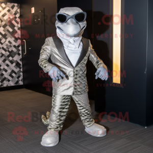 Silver Python mascot costume character dressed with a Suit Pants and Sunglasses