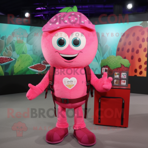 Pink Raspberry mascot costume character dressed with a Sheath Dress and Backpacks