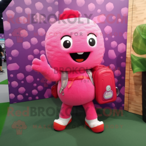 Pink Raspberry mascot costume character dressed with a Sheath Dress and Backpacks