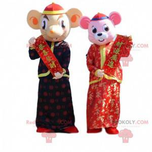 2 mascotes de rato em trajes asiáticos tradicionais -