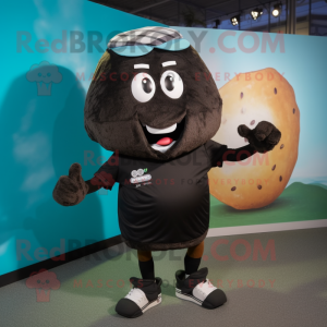 Black Potato mascot costume character dressed with a Bermuda Shorts and Headbands