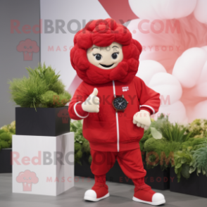 Red Cauliflower mascot costume character dressed with a Hoodie and Smartwatches